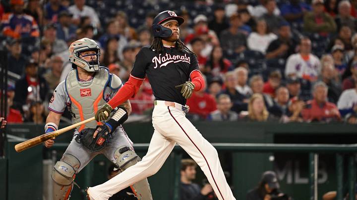 Sep 25, 2026; Washington, District of Columbia, USA;  Washington Nationals shortstop CJ Abrams (5) watches the ball after hitting the ball into play against the New York Mets during the first inning at Nationals Park.  Mandatory Credit: Rafael Suanes-Imagn Images