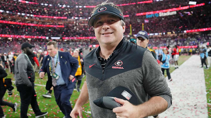 Jan 9, 2023; Inglewood, CA, USA; Georgia Bulldogs head coach Kirby Smart runs off the field after winning the CFP national championship game against the TCU Horned Frogs at SoFi Stadium. Mandatory Credit: Kirby Lee-Imagn Images