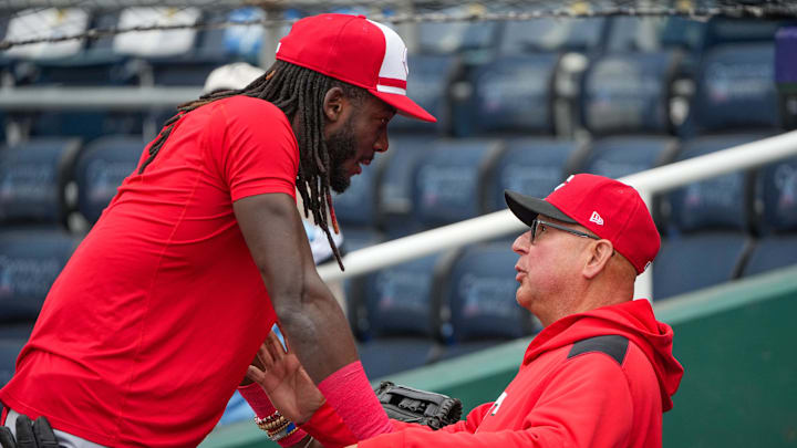 Cincinnati Reds designated hitter Elly De La Cruz (44) talks with manager Terry Francona (77) Cincinnati Reds designated hitter Elly De La Cruz (44) talks with manager Terry Francona (77)