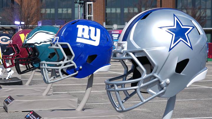 NFC East helmets of the Dallas Cowboys, New York Giants, Philadelphia Eagles, and Washington Commanders at the 2025 NFL Scouting Combine Experience NFC East helmets of the Dallas Cowboys, New York Giants, Philadelphia Eagles, and Washington Commanders at the 2025 NFL Scouting Combine Experience