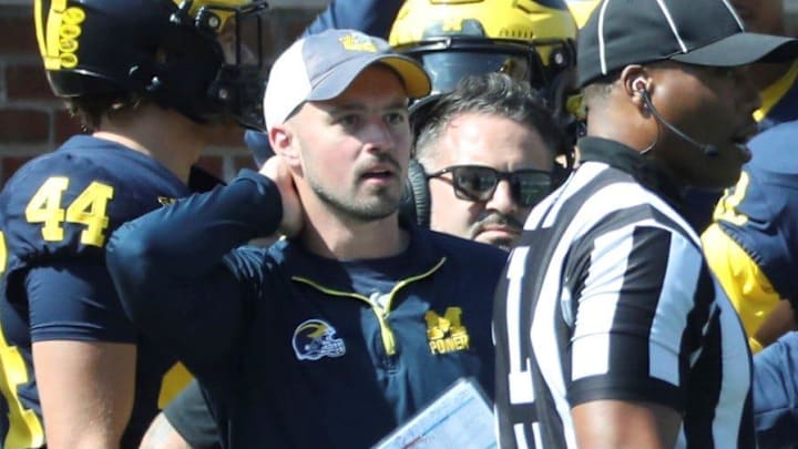 Michigan football analyst Connor Stalions stands on the sideline during the team's game against Rutgers, Sept. 23, 2023 at Michigan Stadium in Ann Arbor.