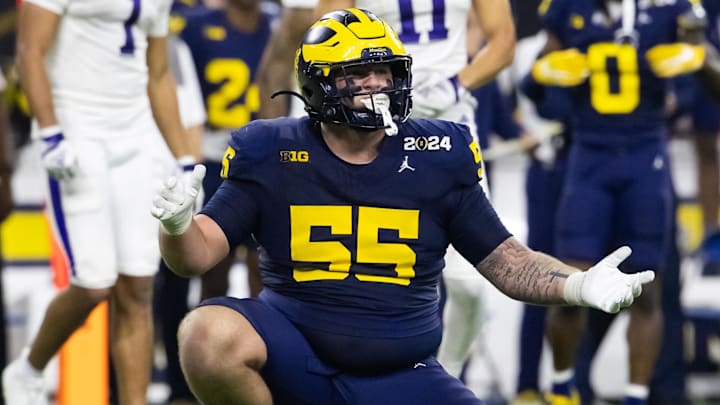 Jan 8, 2024; Houston, TX, USA; Michigan Wolverines defensive lineman Mason Graham (55) against the Washington Huskies during the 2024 College Football Playoff national championship game at NRG Stadium. Mandatory Credit: Mark J. Rebilas-Imagn Images