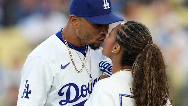 Los Angeles Dodgers shortstop Mookie Betts (50) kisses wife Brianna Betts before the game against the Arizona Diamondbacksat Dodger Stadium.