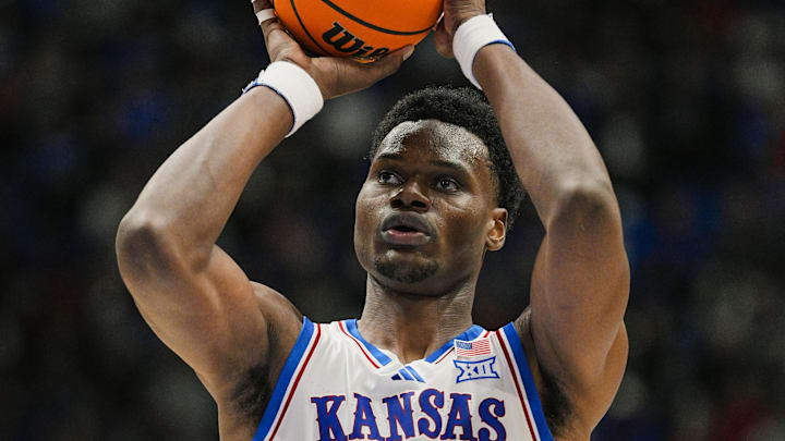 Oct 28, 2025; Lawrence, KS, USA; Kansas Jayhawks center Paul Mbiya (34) shoots a free throw during the second half against the Fort Hays State Tigers at Allen Fieldhouse. Mandatory Credit: Jay Biggerstaff-Imagn Images