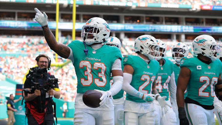 Miami Dolphins cornerback Jason Marshall Jr. (33) celebrates with teammates following an interception during the second quarter against the Tampa Bay Buccaneers at Hard Rock Stadium last December.
