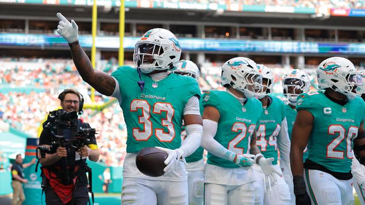 Miami Dolphins cornerback Jason Marshall Jr. (33) celebrates with teammates following an interception during the second quarter against the Tampa Bay Buccaneers at Hard Rock Stadium in December 2025. Miami Dolphins cornerback Jason Marshall Jr. (33) celebrates with teammates following an interception during the second quarter against the Tampa Bay Buccaneers at Hard Rock Stadium in December 2025.