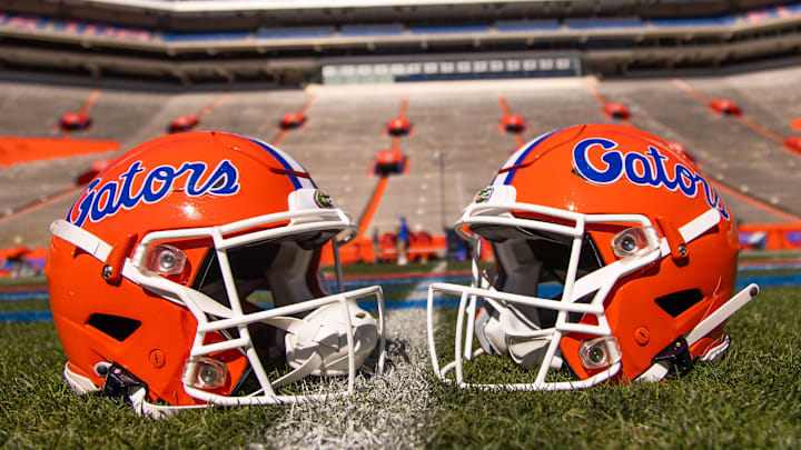 Two helmets rest on Steve Spurrier-Florida Field before the start of the Orange and Blue game at Ben Hill Griffin Stadium in Gainesville, FL on Saturday, April 13, 2024. [Doug Engle/Gainesville Sun]2024