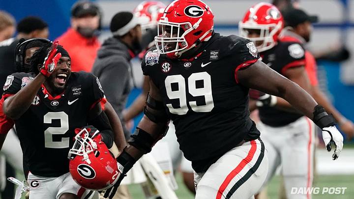 Former Georgia Bulldogs Jordan Davis and Richard LeCounte celebrate during Georgia's Peach Bowl win over the Cincinnati Bearcats in Mercedes-Benz Stadium in Atlanta, Georgia on 1/21/2021. Former Georgia Bulldogs Jordan Davis and Richard LeCounte celebrate during Georgia's Peach Bowl win over the Cincinnati Bearcats in Mercedes-Benz Stadium in Atlanta, Georgia on 1/21/2021.