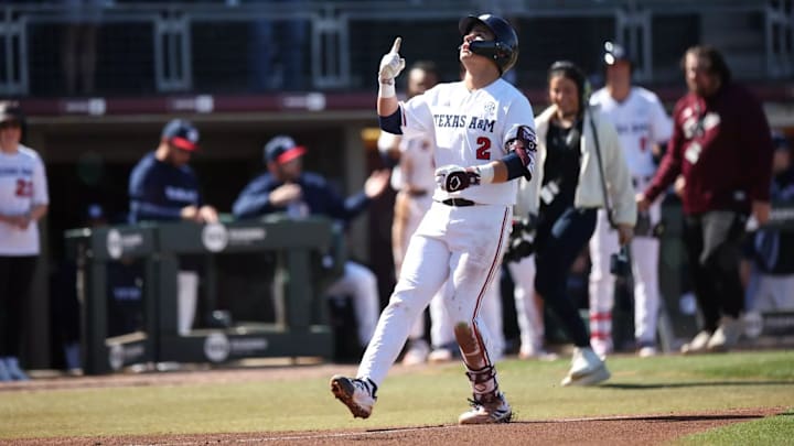 Texas A&M third baseman Nico Partida (2) celebrates after a home run. 