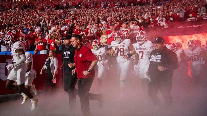 Indiana Head Coach Curt Cignetti leads the team to the field before the Indiana versus Ohio State Big Ten Championship football game at Lucas Oil Stadium on Saturday, Dec. 6, 2025.