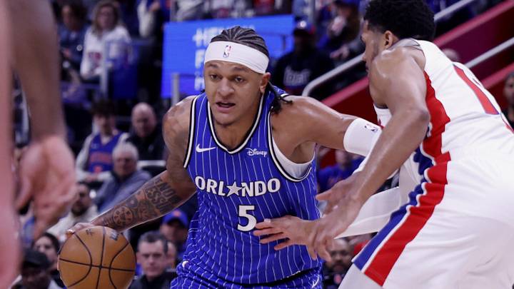 May 3, 2026; Detroit, Michigan, USA; Orlando Magic forward Paolo Banchero (5) dribbles defended by Detroit Pistons forward Tobias Harris (12) in the first half during game seven of the first round of the 2026 NBA Playoffs at Little Caesars Arena. Mandatory Credit: Rick Osentoski-Imagn Images May 3, 2026; Detroit, Michigan, USA; Orlando Magic forward Paolo Banchero (5) dribbles defended by Detroit Pistons forward Tobias Harris (12) in the first half during game seven of the first round of the 2026 NBA Playoffs at Little Caesars Arena. Mandatory Credit: Rick Osentoski-Imagn Images