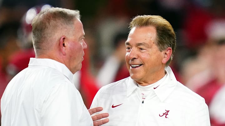 Alabama Crimson Tide head coach Nick Saban greets LSU Tigers head coach Brian Kelly Alabama Crimson Tide head coach Nick Saban greets LSU Tigers head coach Brian Kelly