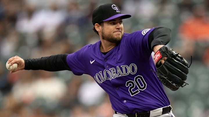 Colorado Rockies pitcher Peter Lambert throws a baseball. 