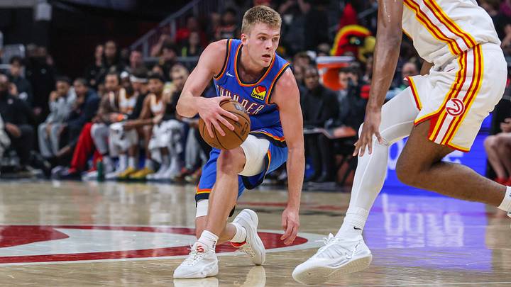 Oct 12, 2026; Atlanta, Georgia, USA; Oklahoma City Thunder guard Bennett Stirtz (14) dribbles against Atlanta Hawks forward Zuby Ejiofor (20) during the fourth quarter at State Farm Arena. Mandatory Credit: Jordan Godfree-Imagn Images Oct 12, 2026; Atlanta, Georgia, USA; Oklahoma City Thunder guard Bennett Stirtz (14) dribbles against Atlanta Hawks forward Zuby Ejiofor (20) during the fourth quarter at State Farm Arena. Mandatory Credit: Jordan Godfree-Imagn Images