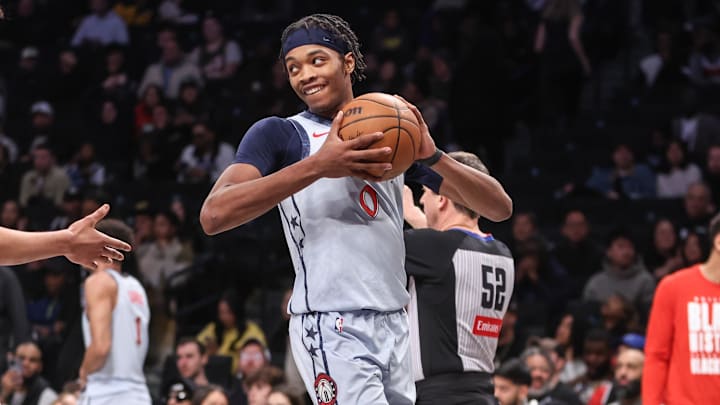 Feb 5, 2025; Brooklyn, New York, USA;  Washington Wizards guard Bilal Coulibaly (0) reacts after recording a triple-double in the fourth quarter against the Brooklyn Nets at Barclays Center. Mandatory Credit: Wendell Cruz-Imagn Images