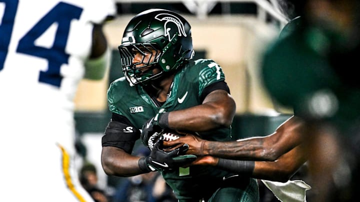 Michigan State's Brandon Tullis runs the ball against Michigan during the third quarter on Saturday, Oct. 25, 2025, at Spartan Stadium in East Lansing.