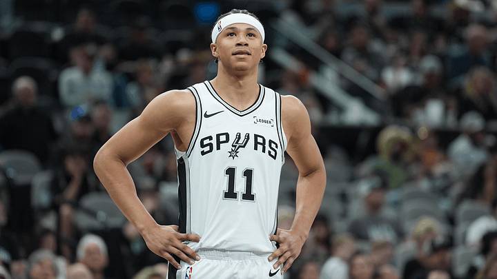 Mar 30, 2026; San Antonio, Texas, USA; San Antonio Spurs forward Carter Bryant (11) looks up in the second half against the Chicago Bulls at Frost Bank Center.