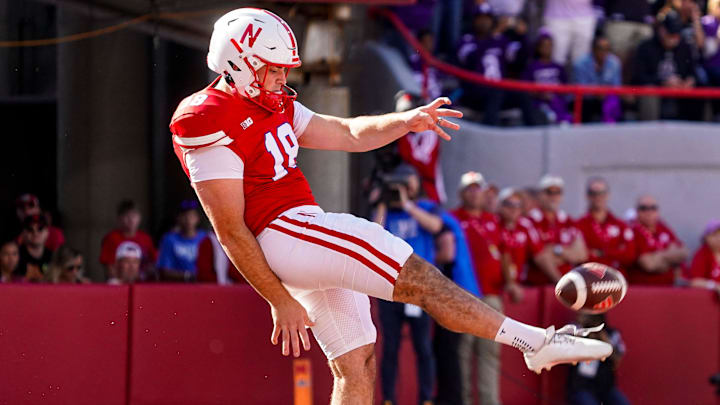 Oct 21, 2023; Lincoln, Nebraska, USA; Nebraska Cornhuskers punter Brian Buschini (18) during the first quarter against the Northwestern Wildcats at Memorial Stadium. 