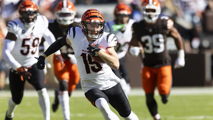 Oct 20, 2024; Cleveland, Ohio, USA; Cincinnati Bengals wide receiver Charlie Jones (15) returns the opening kickoff for a touchdown against the Cleveland Browns during the first quarter at Huntington Bank Field. Mandatory Credit: Scott Galvin-Imagn Images Oct 20, 2024; Cleveland, Ohio, USA; Cincinnati Bengals wide receiver Charlie Jones (15) returns the opening kickoff for a touchdown against the Cleveland Browns during the first quarter at Huntington Bank Field. Mandatory Credit: Scott Galvin-Imagn Images