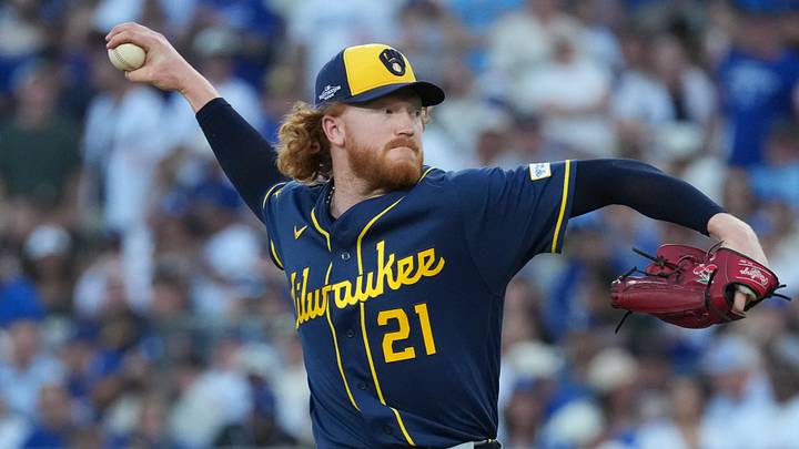 Oct 15, 2026; Los Angeles, California, USA; Milwaukee Brewers pitcher Dustin May (21) throws during the second inning against the Los Angeles Dodgers in game four of the NLCS for the 2026 MLB Playoffs at Uniqlo Field at Dodger Stadium. Mandatory Credit: Kirby Lee-Imagn Images Oct 15, 2026; Los Angeles, California, USA; Milwaukee Brewers pitcher Dustin May (21) throws during the second inning against the Los Angeles Dodgers in game four of the NLCS for the 2026 MLB Playoffs at Uniqlo Field at Dodger Stadium. Mandatory Credit: Kirby Lee-Imagn Images