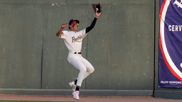 Visalia Rawhide's Druw Jones fields a hit ball against Tuesday, April 11, 2023 against the Rancho Cucamonga Quakes.

0411 Bb Rc Rawhide 7451t