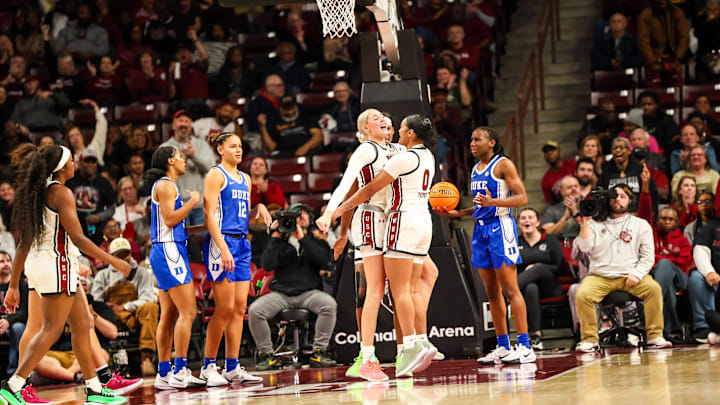 Dec 5, 2024; Columbia, South Carolina, USA; South Carolina Gamecocks forward Chloe Kitts (21) and guard Te-Hina Paopao (0) celebrate a basket against the Duke Blue Devils in the second half at Colonial Life Arena. Mandatory Credit: Jeff Blake-Imagn Images Dec 5, 2024; Columbia, South Carolina, USA; South Carolina Gamecocks forward Chloe Kitts (21) and guard Te-Hina Paopao (0) celebrate a basket against the Duke Blue Devils in the second half at Colonial Life Arena. Mandatory Credit: Jeff Blake-Imagn Images