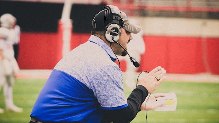 Nine years after leading the O'Neill Eagles to the Class C State Championship, Coach Brock Eichelberger looks ahead to another season of pulling double-duty on the sidelines once again.