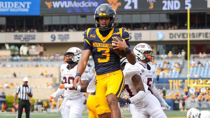 Sep 12, 2026; Morgantown, West Virginia, USA;  West Virginia Mountaineers quarterback Michael Hawkins Jr. (3) runs the ball for a touchdown during the second quarter against the UT Martin Skyhawks at Milan Puskar Stadium.  Mandatory Credit: Ben Queen-Imagn Images
