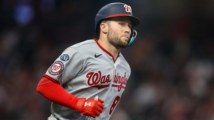 Sep 29, 2023; Atlanta, Georgia, USA; Washington Nationals third baseman Carter Kieboom (8) hits a home run against the Atlanta Braves in the fourth inning at Truist Park