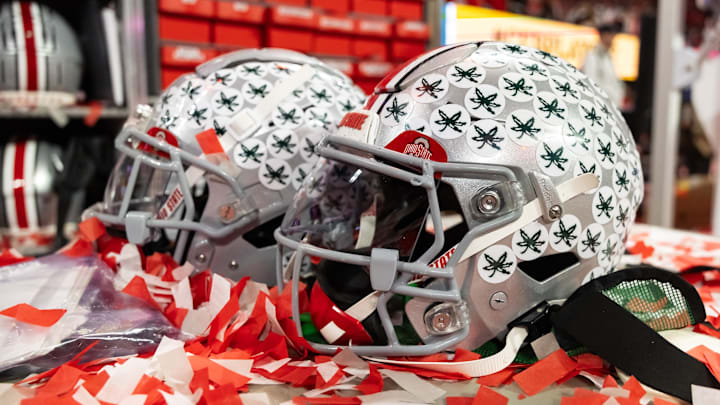 Jan 20, 2025; Atlanta, GA, USA; Detailed view of confetti with an Ohio State Buckeyes helmet after winning the CFP National Championship college football game at Mercedes-Benz Stadium. Mandatory Credit: Mark J. Rebilas-Imagn Images