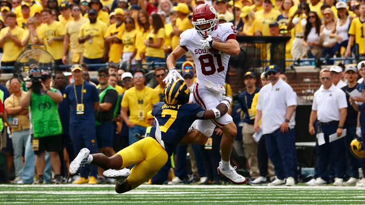 Oklahoma tight end Rocky Beers tries to break a tackle after a catch in the first half against the Michigan Wolverines. Oklahoma tight end Rocky Beers tries to break a tackle after a catch in the first half against the Michigan Wolverines.