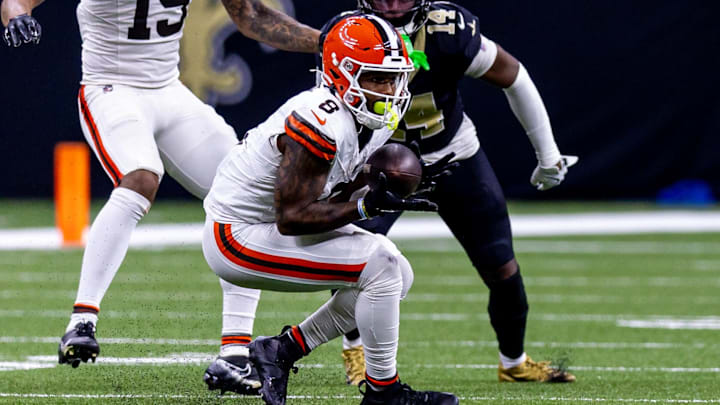 Nov 17, 2024; New Orleans, Louisiana, USA;  Cleveland Browns wide receiver Elijah Moore (8) catches a pass against New Orleans Saints cornerback Kool-Aid McKinstry (14) during the second half at Caesars Superdome. Mandatory Credit: Stephen Lew-Imagn Images