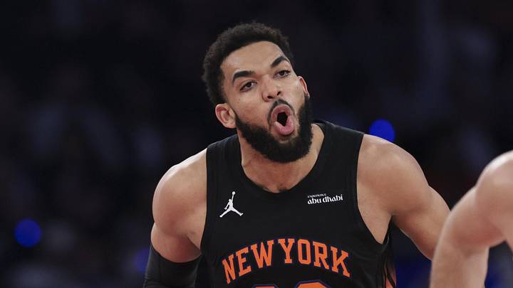 May 21, 2026; New York, New York, USA; New York Knicks center Karl-Anthony Towns (32) reacts as Cleveland Cavaliers guard Max Strus (2) runs up the court during the second quarter of game two of the eastern conference finals of the 2026 NBA playoffs at Madison Square Garden. Mandatory Credit: Vincent Carchietta-Imagn Images