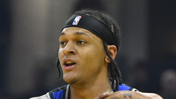 Orlando Magic forward Paolo Banchero rebounds in the first quarter against the Cleveland Cavaliers.