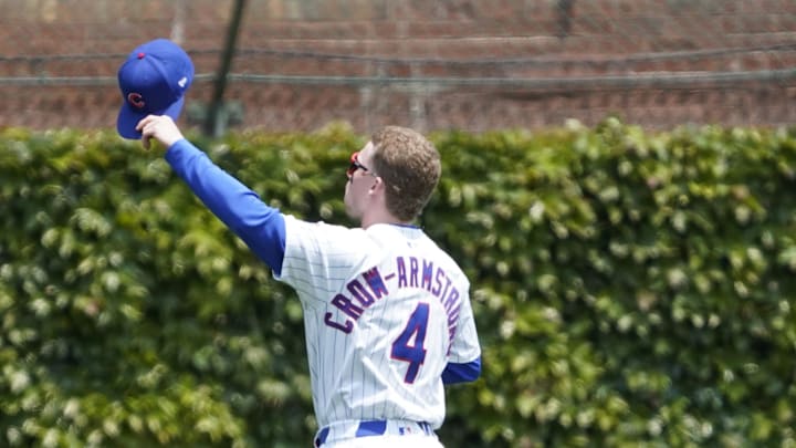 Jun 1, 2025; Chicago, Illinois, USA; Chicago Cubs outfielder Pete Crow-Armstrong (4) waves to the fans before a game between the Chicago Cubs and the Cincinnati Reds at Wrigley Field.