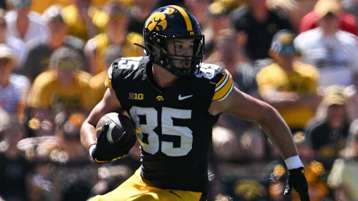 Aug 31, 2024; Iowa City, Iowa, USA; Iowa Hawkeyes tight end Luke Lachey (85) looks for yards after catch against the Illinois State Redbirds during the second quarter at Kinnick Stadium. Mandatory Credit: Jeffrey Becker-Imagn Images