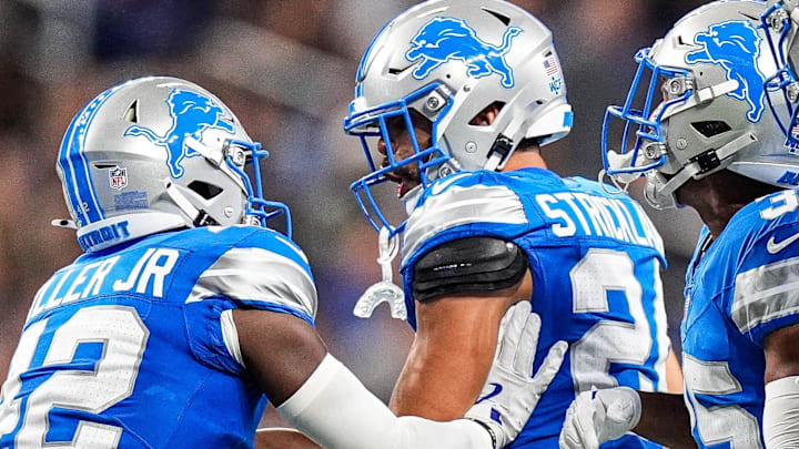 Detroit Lions safety Loren Strickland (24), center, celebrates a play against Houston Texans Detroit Lions safety Loren Strickland (24), center, celebrates a play against Houston Texans