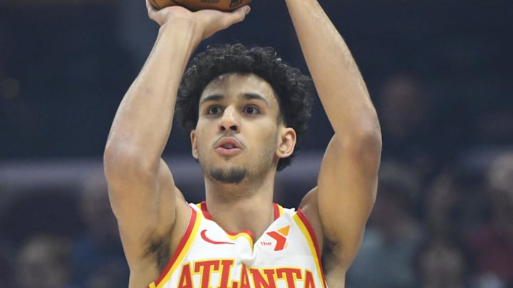 Jan 30, 2025; Cleveland, Ohio, USA; Atlanta Hawks forward Zaccharie Risacher (10) shoots in the first quarter against the Cleveland Cavaliers at Rocket Mortgage FieldHouse. Mandatory Credit: David Richard-Imagn Images
