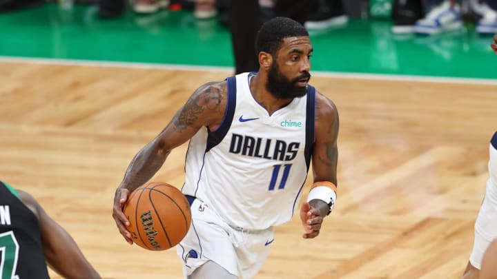 Jun 9, 2024; Boston, Massachusetts, USA; Dallas Mavericks guard Kyrie Irving (11) dribbles the ball against the Boston Celtics during the fourth quarter in game two of the 2024 NBA Finals at TD Garden. Mandatory Credit: Peter Casey-USA TODAY Sports Jun 9, 2024; Boston, Massachusetts, USA; Dallas Mavericks guard Kyrie Irving (11) dribbles the ball against the Boston Celtics during the fourth quarter in game two of the 2024 NBA Finals at TD Garden. Mandatory Credit: Peter Casey-USA TODAY Sports