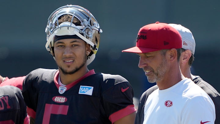 San Francisco 49ers quarterback Trey Lance (L) and head coach Kyle Shanahan (R)