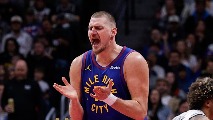 Nov 28, 2025; Denver, Colorado, USA; Denver Nuggets center Nikola Jokic (15) reacts after a play in the fourth quarter against the San Antonio Spurs at Ball Arena.
