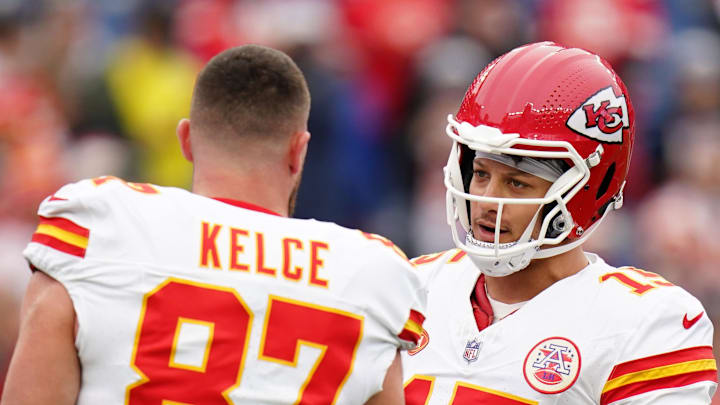 Dec 17, 2023; Foxborough, Massachusetts, USA; Kansas City Chiefs quarterback Patrick Mahomes (15) and tight end Travis Kelce (87) warm up before the game against the New England Patriots at Gillette Stadium. Mandatory Credit: David Butler II-Imagn Images