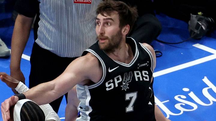 May 26, 2026; Oklahoma City, Oklahoma, USA; Oklahoma City Thunder guard Shai Gilgeous-Alexander (2) is fouled by San Antonio Spurs center Luke Kornet (7) during the third quarter in game five of the western conference finals for the 2026 NBA playoffs at Paycom Center. Mandatory Credit: Brett Rojo-Imagn Images