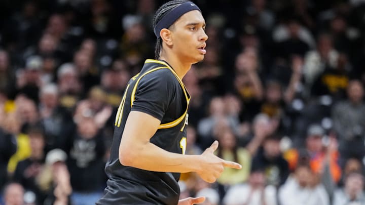 Jan 14, 2026; Columbia, Missouri, USA; Missouri Tigers guard Aaron Rowe (1) celebrates after scoring a three point shot against the Auburn Tigers during the first half of the game at Mizzou Arena. Mandatory Credit: Denny Medley-Imagn Images