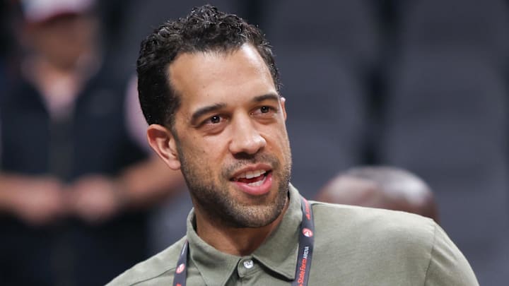 Atlanta Hawks general manager Landry Fields looks on before a game against the Charlotte Hornets.