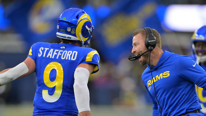 Jan 4, 2026; Inglewood, California, USA;  Los Angeles Rams head coach Sean McVay reacts with quarterback Matthew Stafford (9) after a touchdown against the Arizona Cardinals during the second half at SoFi Stadium. Mandatory Credit: Jayne Kamin-Oncea-Imagn Images