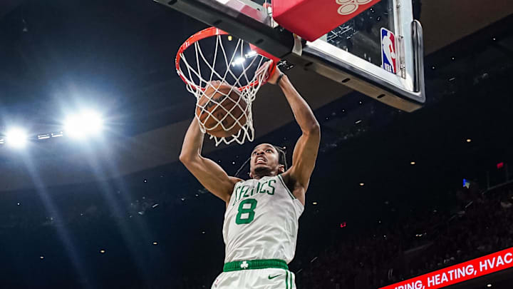 Oct 29, 2025; Boston, Massachusetts, USA; Boston Celtics forward Josh Minott (8) makes the basket against the Cleveland Cavaliers in the second quarter at TD Garden. Mandatory Credit: David Butler II-Imagn Images