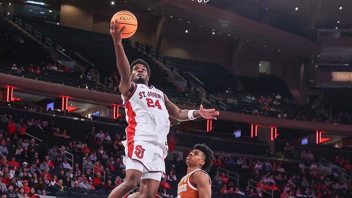 Oct 25, 2026; New York, NY, USA; St. John's Red Storm guard Tounde Yessoufou (24) drives past Texas Longhorns guard Isaiah Johnson (2) in the second half at Madison Square Garden. Oct 25, 2026; New York, NY, USA; St. John's Red Storm guard Tounde Yessoufou (24) drives past Texas Longhorns guard Isaiah Johnson (2) in the second half at Madison Square Garden.