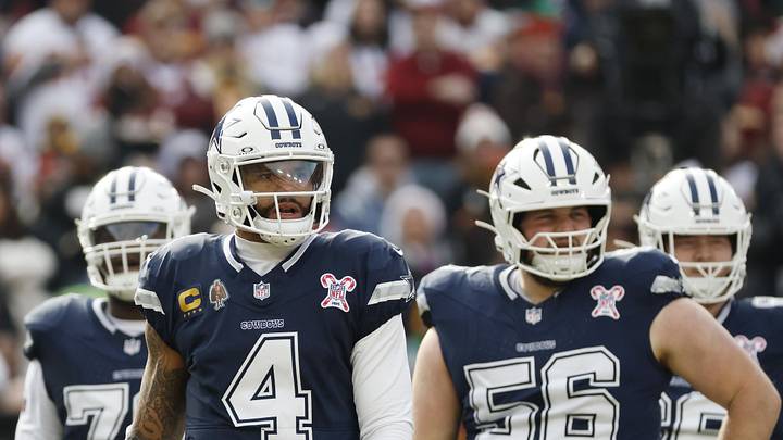 Dallas Cowboys quarterback Dak Prescott looks on during a stoppage in play against the Washington Commanders.