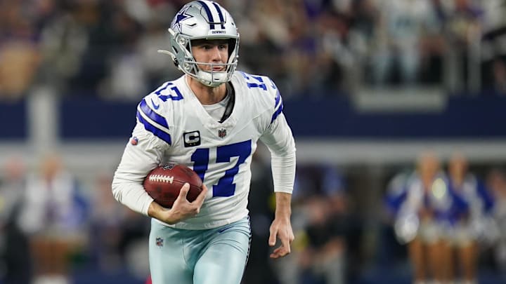 Dec 14, 2025; Arlington, Texas, USA; Dallas Cowboys place kicker Brandon Aubrey (17) runs a fake field goal during the first half against the Minnesota Vikings at AT&T Stadium.